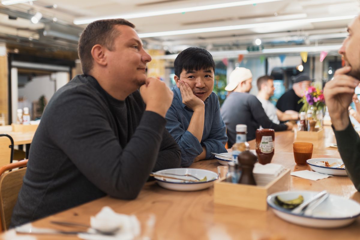 Friends enjoying a meal together at a casual restaurant